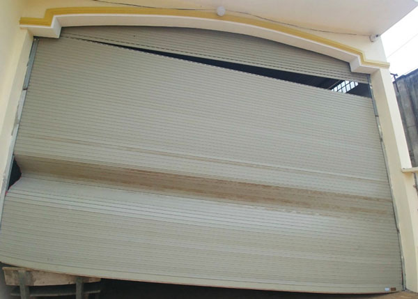 sửa cửa cuốn bị sập tại Quận 7
