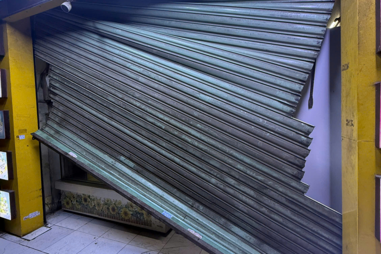 SỬA CỬA CUỐN ĐỨT NAN